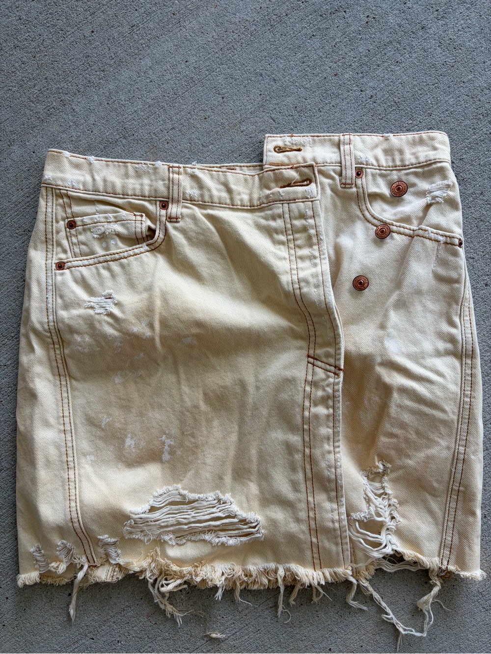 We The Free Cream Distressed Mini Denim Skirt